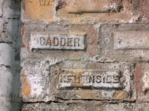 Two of the bricks from the basement with the names Cadder and Kelvinside on them