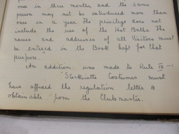 Handwritten extract from the Ladies Minute Book, saying "An addition was made to Rule 12-: 'Stockinette Costumes must have affixed the regulation letter A obtainable from the Clubmaster."