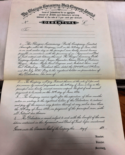 Photograph of a debenture certificate issued by the Glasgow Swimming Baths Company Limited