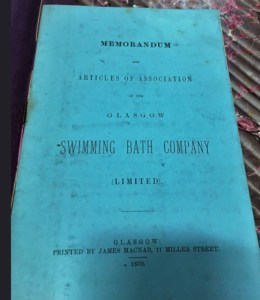 blue booklet cover with the text 'Cover of the Memorandum and Articles of Association of the Glasgow Swimming Bath Company Ltd. Glasgow, Printed by James McNab, 11 Miller Street, 1870'