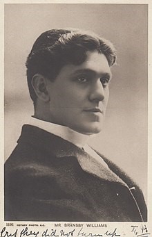 Head and shoulders partial profile photo in black and white